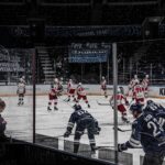 ice hockey players on ice hockey field