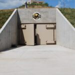 Luxury underground bunker entrance representing billionaire preppers' escape infrastructure