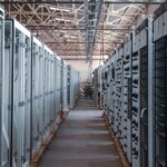A high-tech server room data center representing the physical infrastructure required for Canadian digital independence.