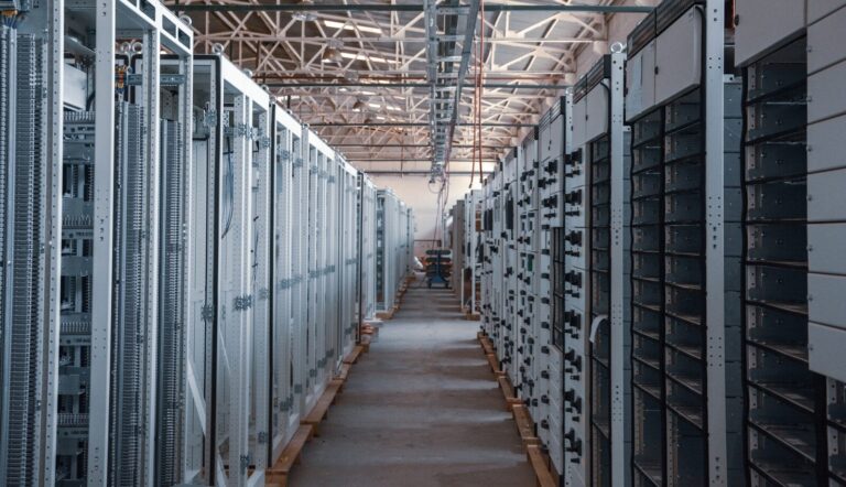 A high-tech server room data center representing the physical infrastructure required for Canadian digital independence.